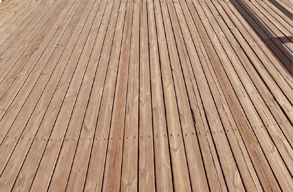 Wood surface showcasing natural grain and texture, highlighting durability and potential for extended lifespan with nano coating solutions.